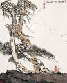 中国の伝統的な木々の下にある方曾の人物像